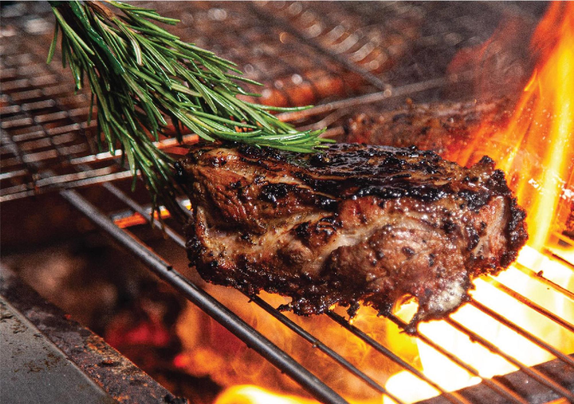 Jumeirah Messilah Beach Kuwait Kuwait City Eksteriør billede A steak being grilled